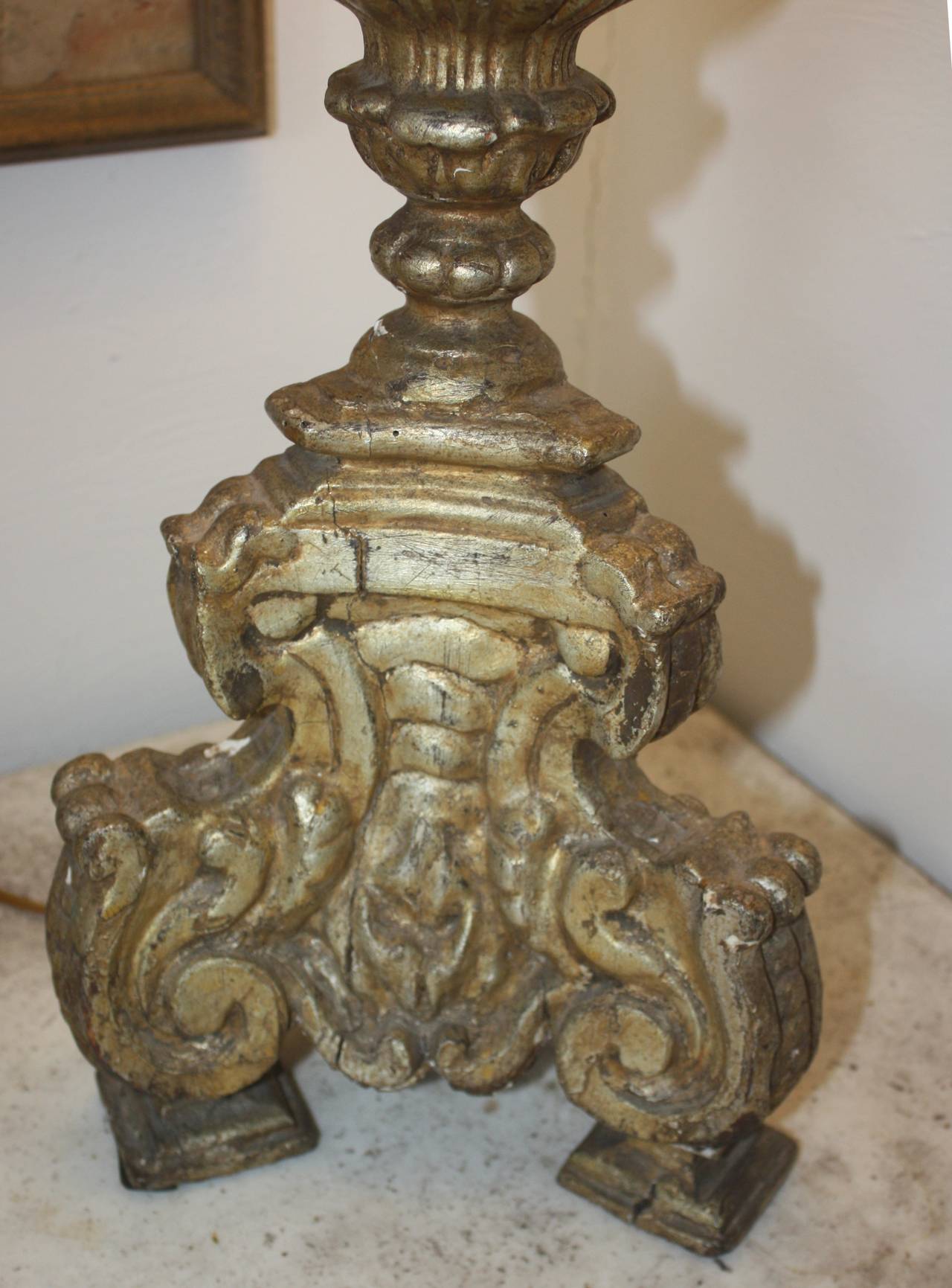 A large-scale Italian silver gilt altar stick, circa 1750, now mounted as an electrified table lamp.