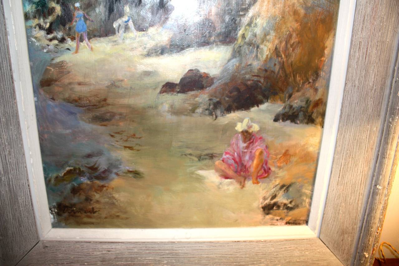 A pleasant oil-on-board painting in it's original grey washed wood frame depicting a beach scene with bathers, signed indistinctly 