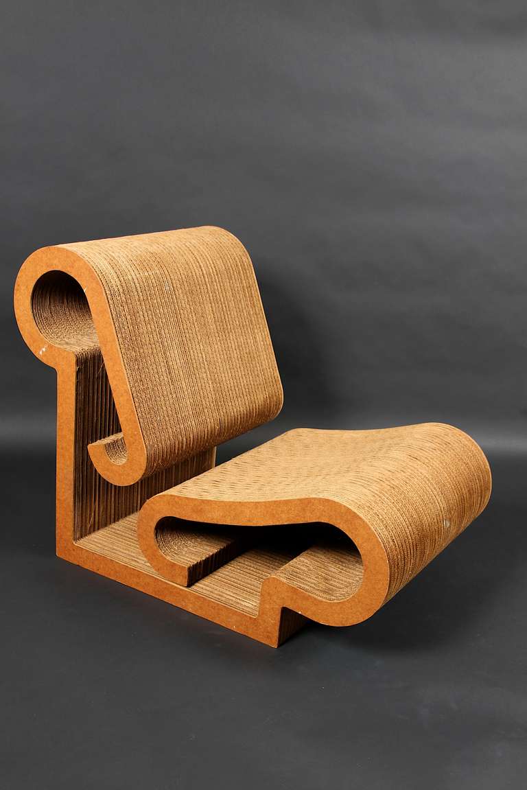 A super-rare set of 4 Frank Gehry "Contour" lounge chairs, designed in 1970, fabricated in 1973 in masonite and cardboard.  It might take years to assemble a set of 4, but these have remained together in storage since they were produced. 