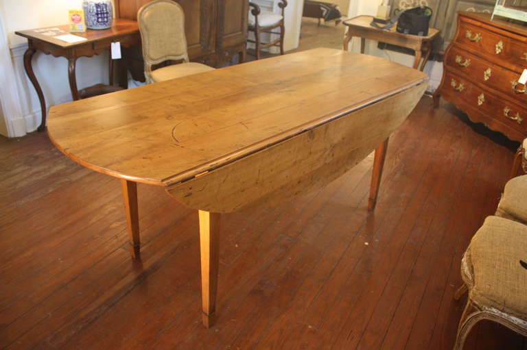 Cherry 19th Century French Oval Drop-leaf Farm Table
