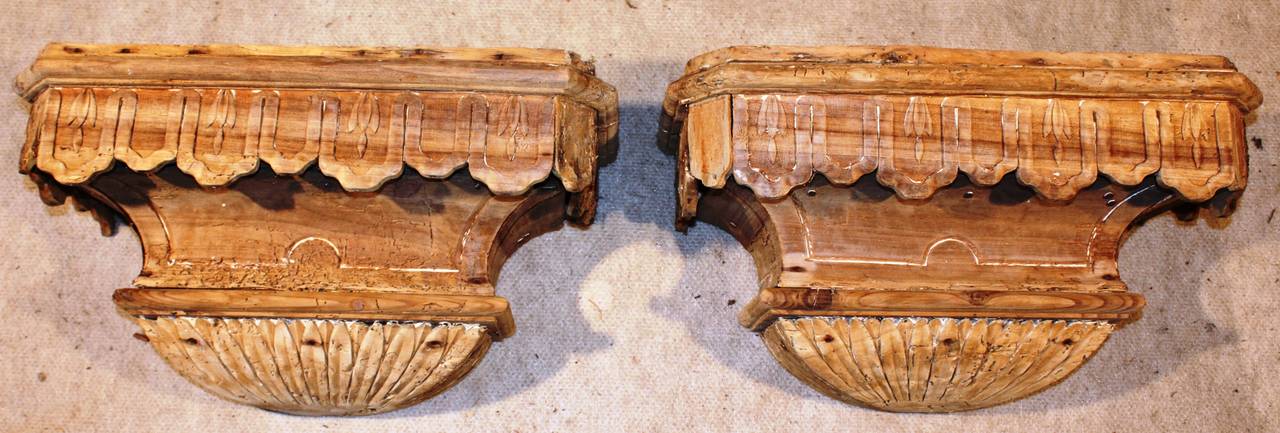 An great pair of stripped and bleached carved pine wall brackets, French Louis XVI circa 1790.