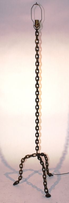 A fun floor lamp made of welded iron chain, French circa 1940's.