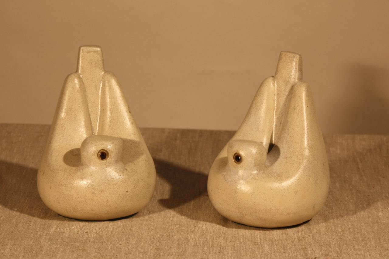 A pair of Mid-Century Modern bookends in the shape of stylized doves, circa 1960.