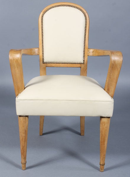 A good set of 4 Andre Arbus Style armchairs with upholstered seat and back, shaped armrests and turned legs, French circa 1940.