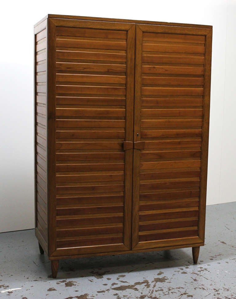 Gio Ponti 
Armoire, c. 1943
Oak, brass, Italian walnut.