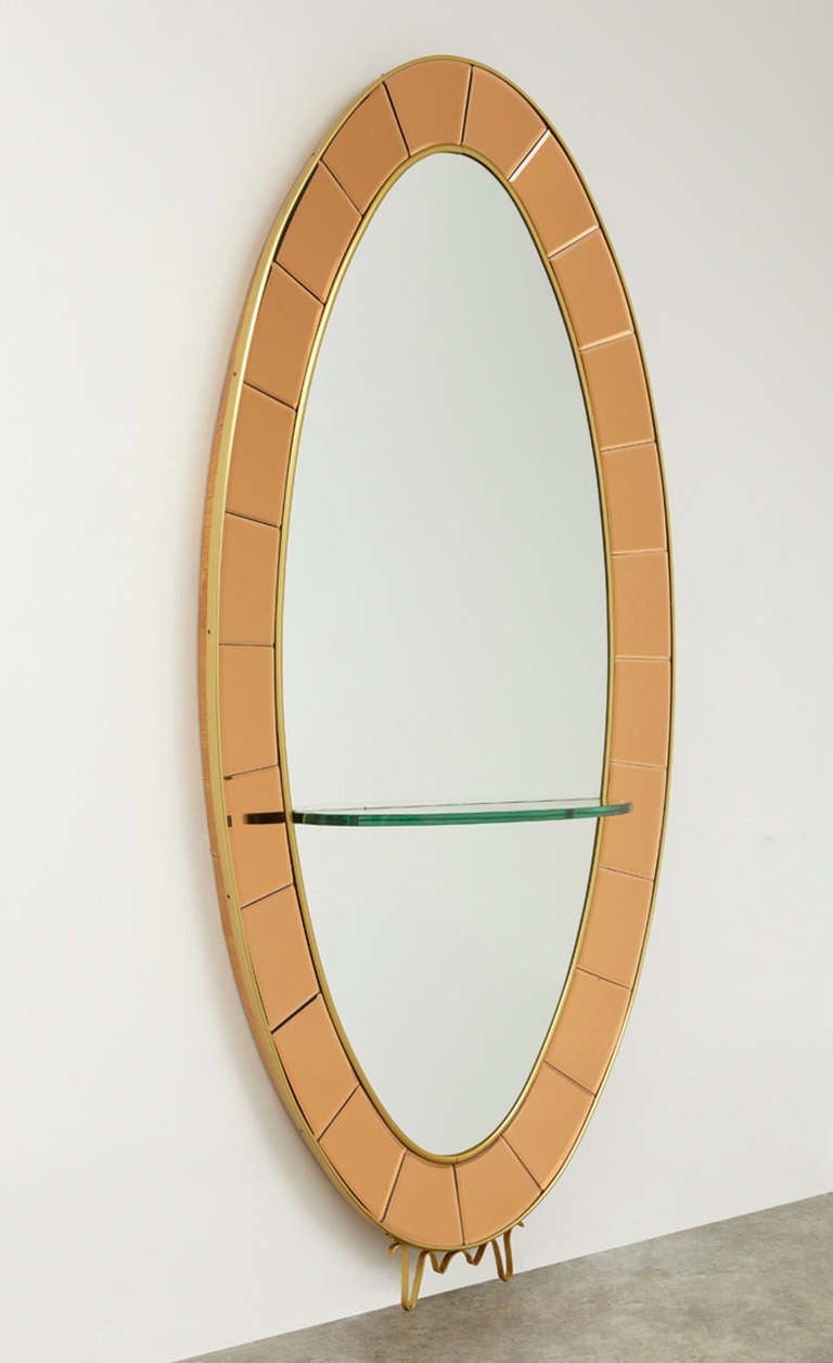 Crystal Arte standing mirror with glass shelf.