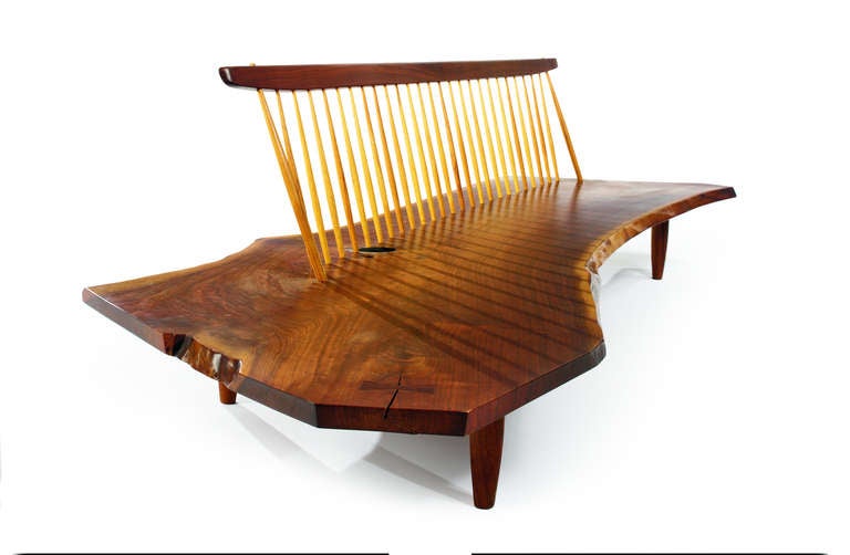 George Nakashima (1905-1990)
Conoid Bench with back
Design: c. 1961
Production date of this example: 1974
American black walnut and hickory
31 x 114 x 41 ¼ in. (78.7 x 289.6 x 104.8cm)
Provenance: Collection of Mr. Nelson Rockefeller
Signed: