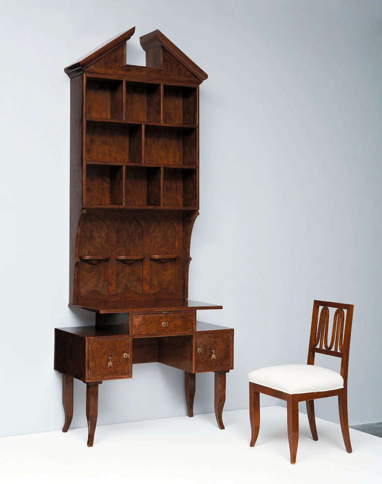 Secretaire: walnut root-veneered wood, walnut, satinwood, bronze, wood; chair: walnut, fabric, bentwood. Chair with paper label.

Literature: Ugo La Pietra, Gio Ponti, New York, 1996, pp. 8-11 for similar examples of the secretaire, pp. 10-11 for