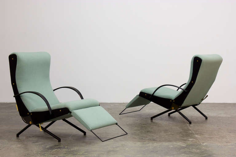 Osvaldo Borsani, pair of lounge chairs, model no. P40, circa 1955.
Painted steel, brass, rubber, upholstery. Produced by Tecno, Italy. Signed with manufacturer’s metal mark to each side.

Literature: 
Guiliana Gramigna and Fulvio Irace, Osvaldo