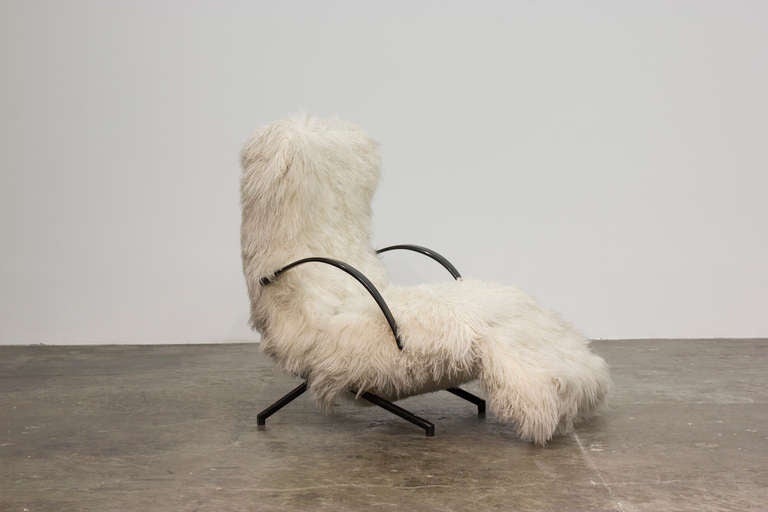 A P40 lounge chair designed by Osvaldo Borsani and manufactured by Tecno, now upholstered in Mongolian goat fur. 

Frame is signed with manufacturer’s metal roundel.