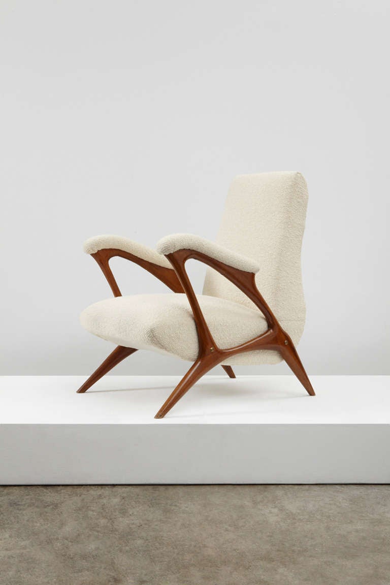 Lounge chair by Italian designer Pierluigi Giordani, produced in the late 1950s made of walnut, fabric and brass.