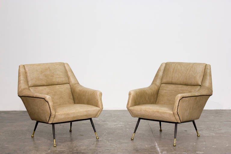 GIO PONTI
Pair of armchairs , ca. 1945
Painted metal, brass, vinyl.

Sold with a certificate of authenticity from the Gio Ponti Archive.