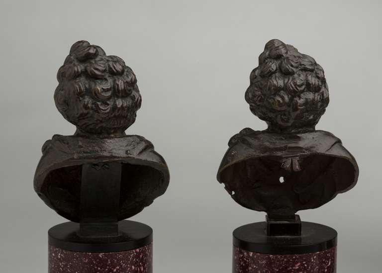 Pair of Italian Patinated Bronze Putti on Gilt Bronze-Mounted Porphyry Bases For Sale 1