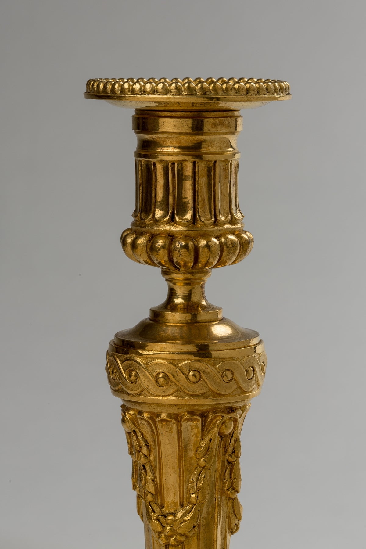 19th Century Pair of Louis XVI Style Ormolu Candlesticks For Sale