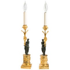 Pair of Directoire Ormolu and Patinated Bronze Figural Candlesticks