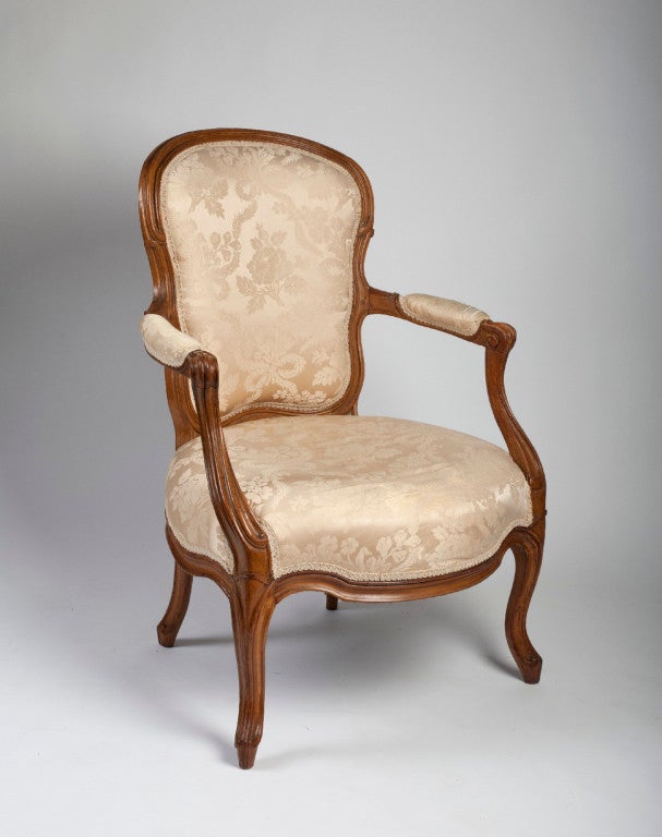 French Large Louis XV Beechwood Fauteuil Cabriolet, stamped Delanois