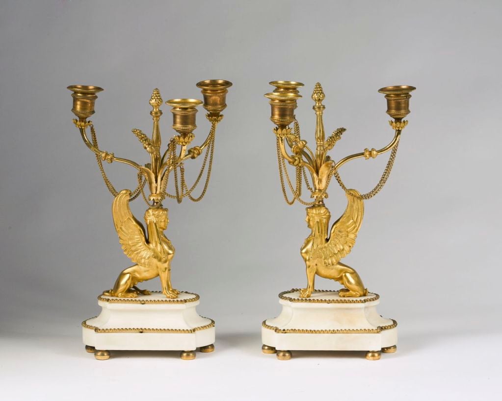 Rare Pair of Regency Ormolu and White Marble Sphinx Three-Light Candelabra