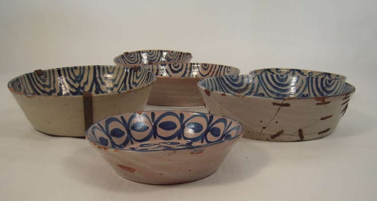 A Striking Collection of 7 Spanish Blue and White Pottery Bowls 1