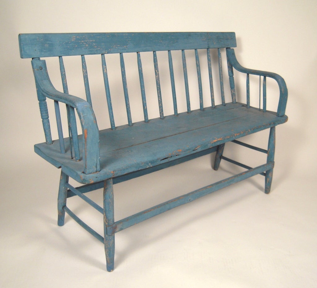 A 19th century American country bench in original blue paint. 
Ideal for an entry hall, porch or at the end of a bed.