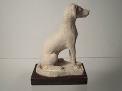 Plaster Sculpture of a Seated Dog