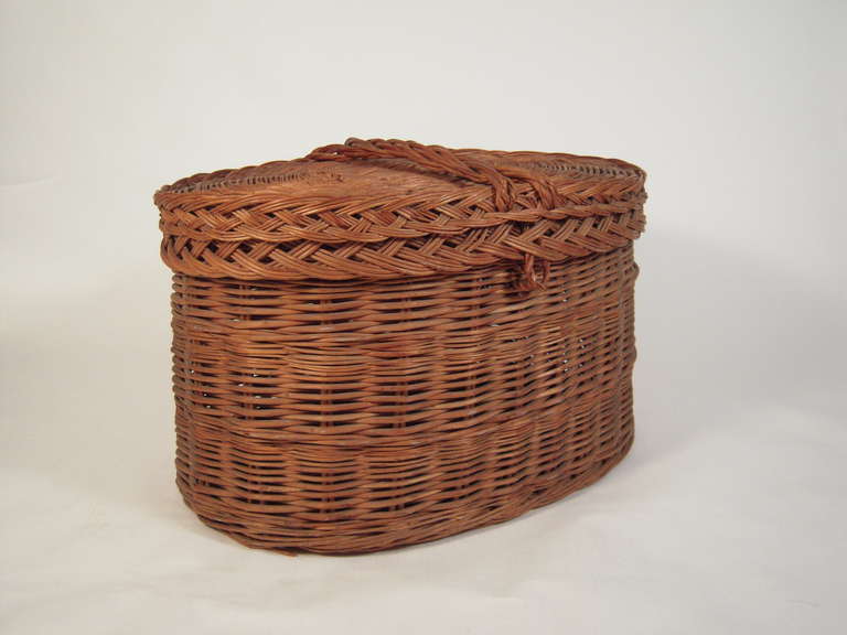 Very Large Oval Covered Rattan Basket 1