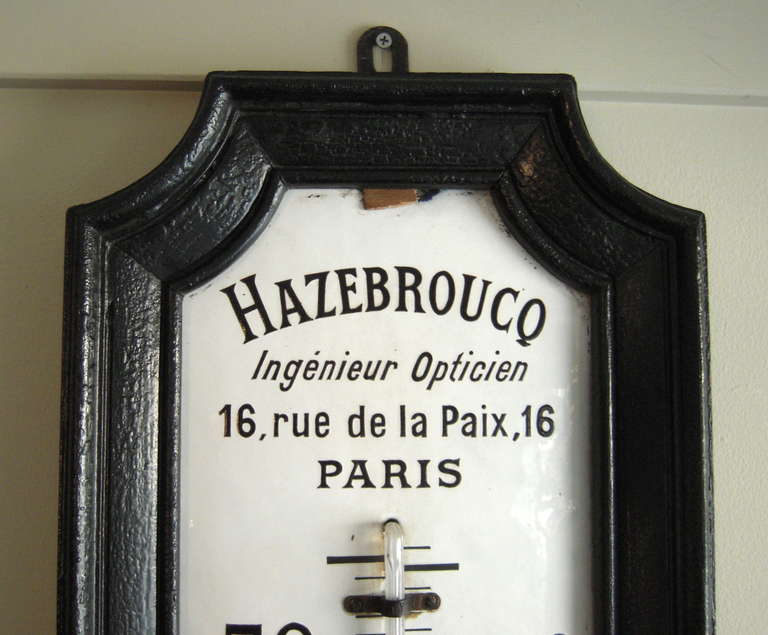 A  highly decorative and unusual, large enameled French optician's trade sign thermometer, the enameled dial reading Hazebroucq Ingenieur Opticien 16, rue de la Paix, 16 Paris, with raised numerals, Fahrenheit and Centigrade scales, pierced cast
