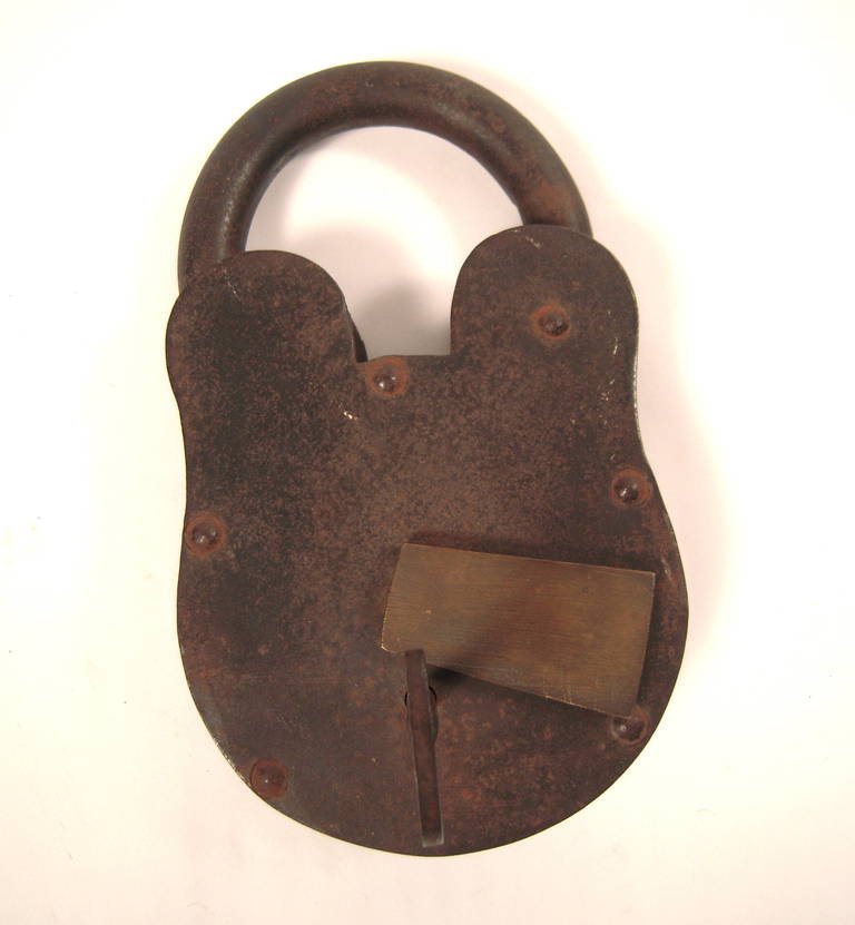 A giant, working cast iron padlock with original key.