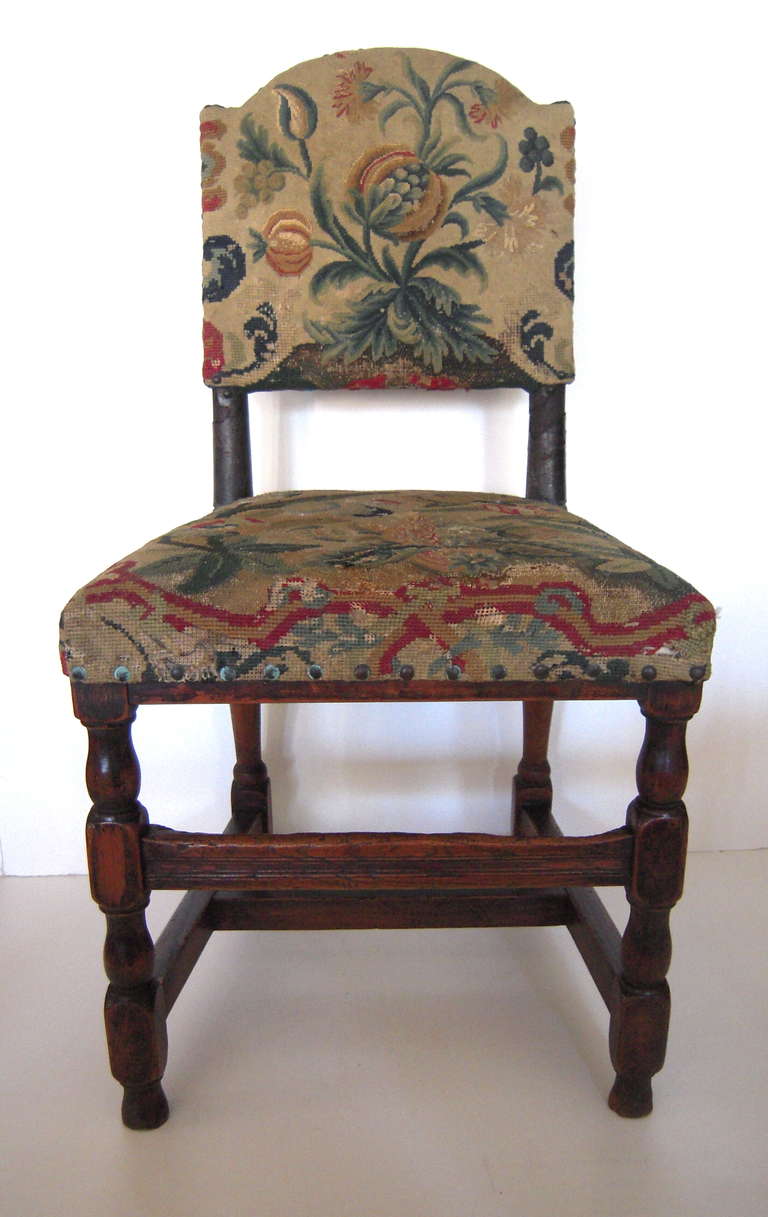 An Early 18th Century Chair Upholstered in Period Tapestry