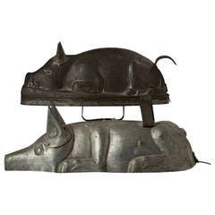 Two 19th Century Tin Pig-Form Cooking Molds