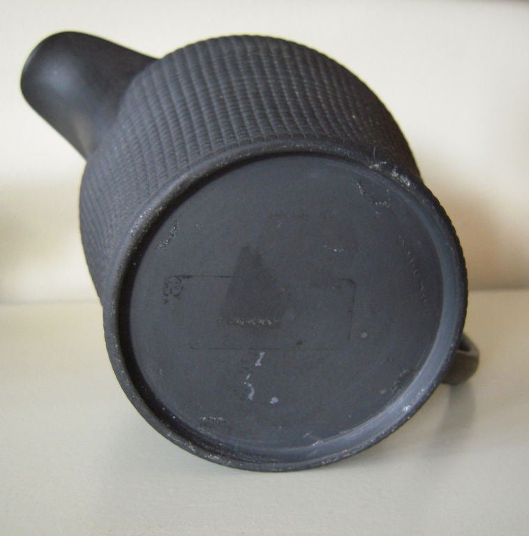 An English neoclassical ceramic  'black basalt'  (stoneware/jaswerware) creamer, c. 1810-20, of strikingly modern form and design.<br />
<br />
Black basalt ware is also called Egyptian Black basalt. This hard black stoneware, identical in