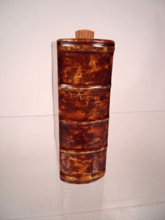 American Rockingham Pottery 'Departed Spirits' Book Form Flask. c. 1880s
