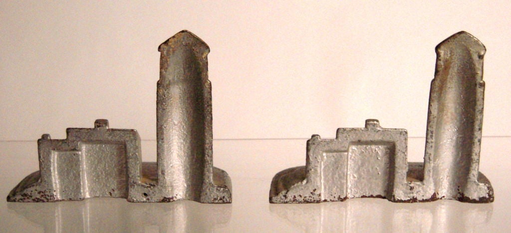 Folk Art Pair of Cast Iron Lighthouse Doorstops