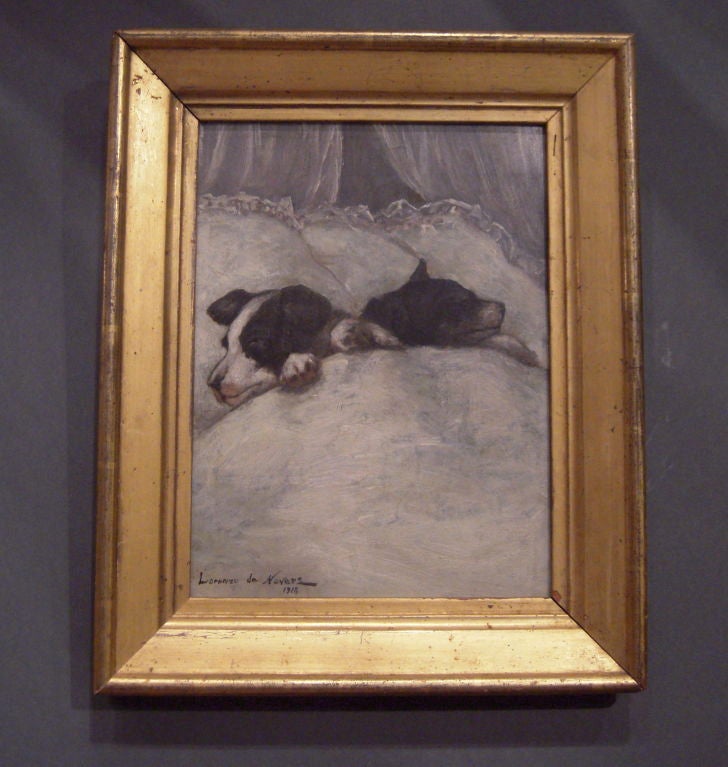 An unusual oil on board painting depicting 2 cozy puppies dozing in a luxurious bed by Lorenzo de Nevers (listed Canadian artist, active in Rhode Island.). Signed and dated lower left. In a gilt wood frame.<br />
BIOGRAPHICAL INFORMATION from
