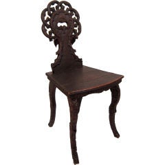 A Charming Black Forest Carved Twig Chair