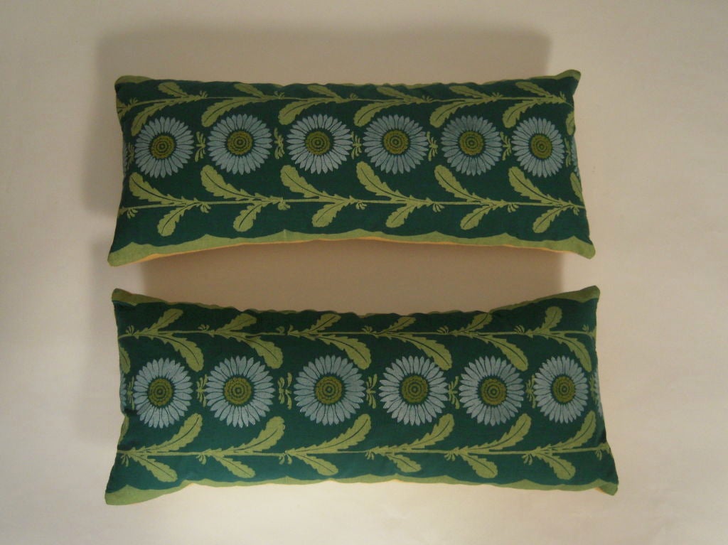 VINTAGE FOLLY COVE DESIGNERS HAND BLOCK PRINTED FABRIC, IN YELLOW AND WHITE ON GREEN COTTON, IN THE ‘LAZY DAISY’ PATTERN BY LOUISE KENYON, NEWLY MADE INTO PILLOWS, DOWN FILLED AND BACKED WITH YELLOW LINEN. American, circa 1950. 1 available.<br