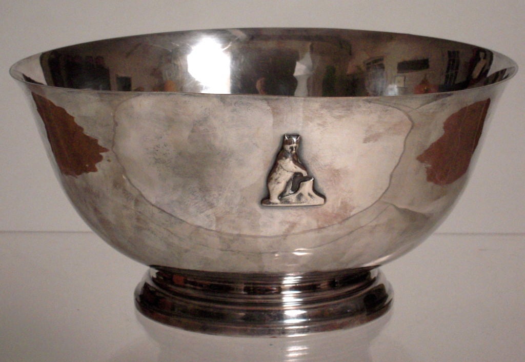 A Spee Club Harvard University presentation bowl with standing bear and tree stump emblem on the front and inscription engraved on the back dedicated to 