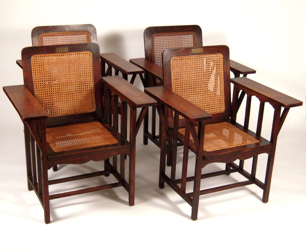 A SET OF FOUR  AMERICAN ARTS & CRAFTS DARK STAINED AND WAXED  OAK CANED CHAIRS, DESIGNED BY DAVID WOLCOTT KENDALL, CIRCA 1894 AND MANUFACTURED BY HUBBARD, ELDREDGE & MILLER OF ROCHESTER, NY, circa 1894-1915. NEWLY RESTORED.<br />
<br />
These