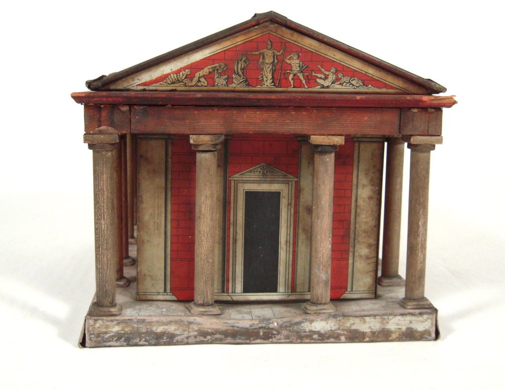 A whimsical and rare English bread box in the form of a red and white classical temple in painted and printed tin, glass and wood. The roof comes off and encloses a tin lined box for bread and biscuit storage.