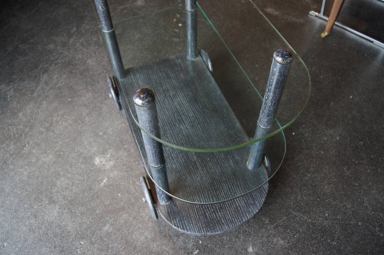 Ébénisé Ebonized Oak and Glass Tea Cart in the style of Gilbert Rohde en vente