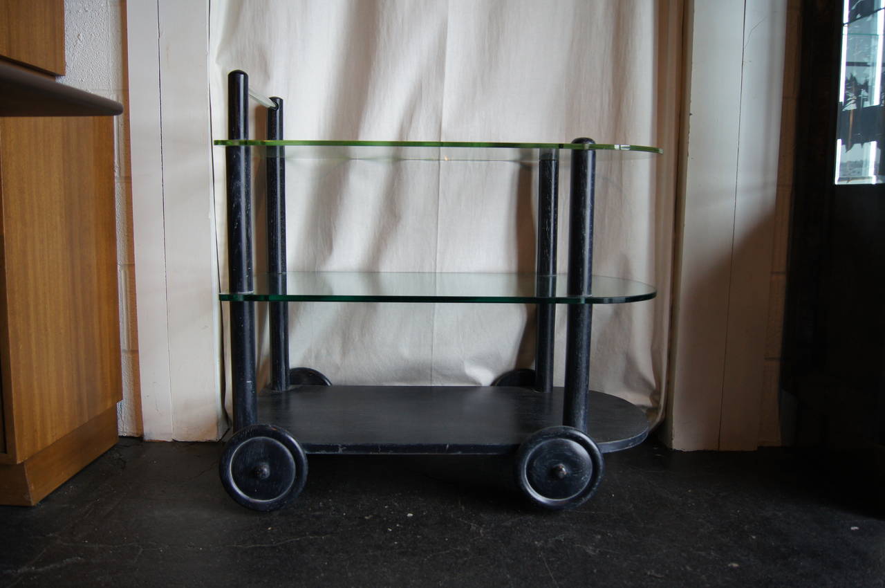Mid-20th Century Ebonized Oak and Glass Tea Cart in the style of Gilbert Rohde For Sale