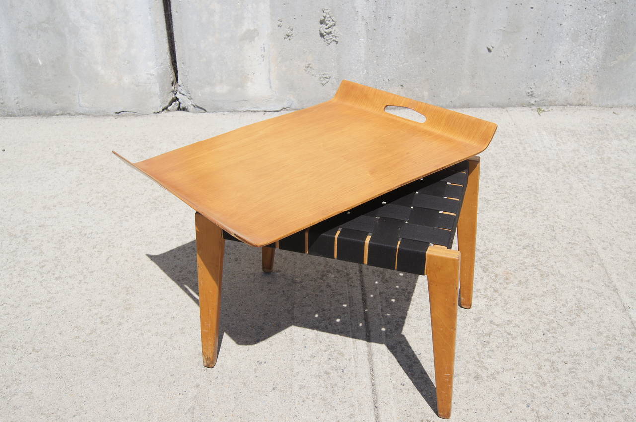 This unique table is an early Abel Sorenson design for Knoll. It features a molded birch tray that sits on a birch-frame stool with a webbed seat. The stool has been newly restrapped with vintage cotton webbing. 

The tray measures 24.5