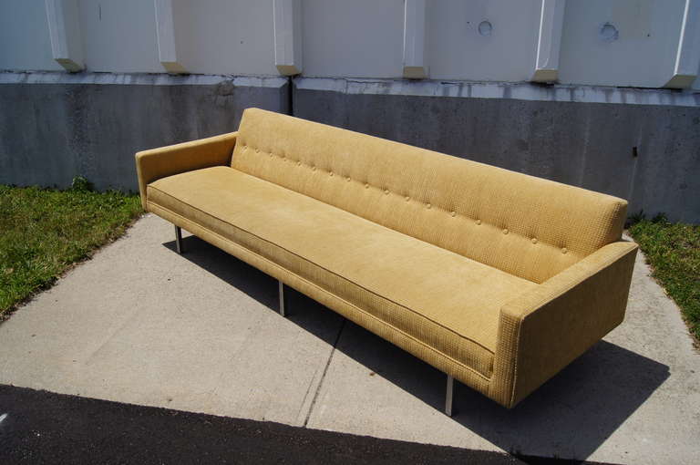 This Model 0693 sofa designed by George Nelson for Herman Miller features a single bank seat cushion which can easily accommodate 4 or more people. The chenille type fabric is in excellent condition.