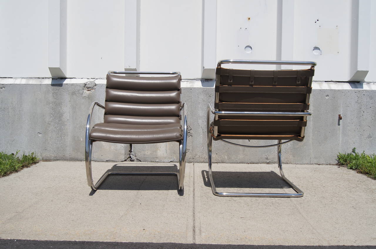 Designed by Mies van der Rohe in 1927 for the Weissenhof exhibition in Stuttgart, Germany, and manufactured by Knoll, the MR lounge chairs are a classic of early modernism. The cantilevered tubular steel frame and generously proportioned soft brown