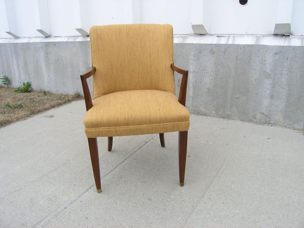 Edward Wormley designed this handsome mahogany armchair for Dunbar, juxtaposing modern linearity with curvaceous classic form. It has been expertly reupholstered in Knoll's Rivington textile in Sunflower.