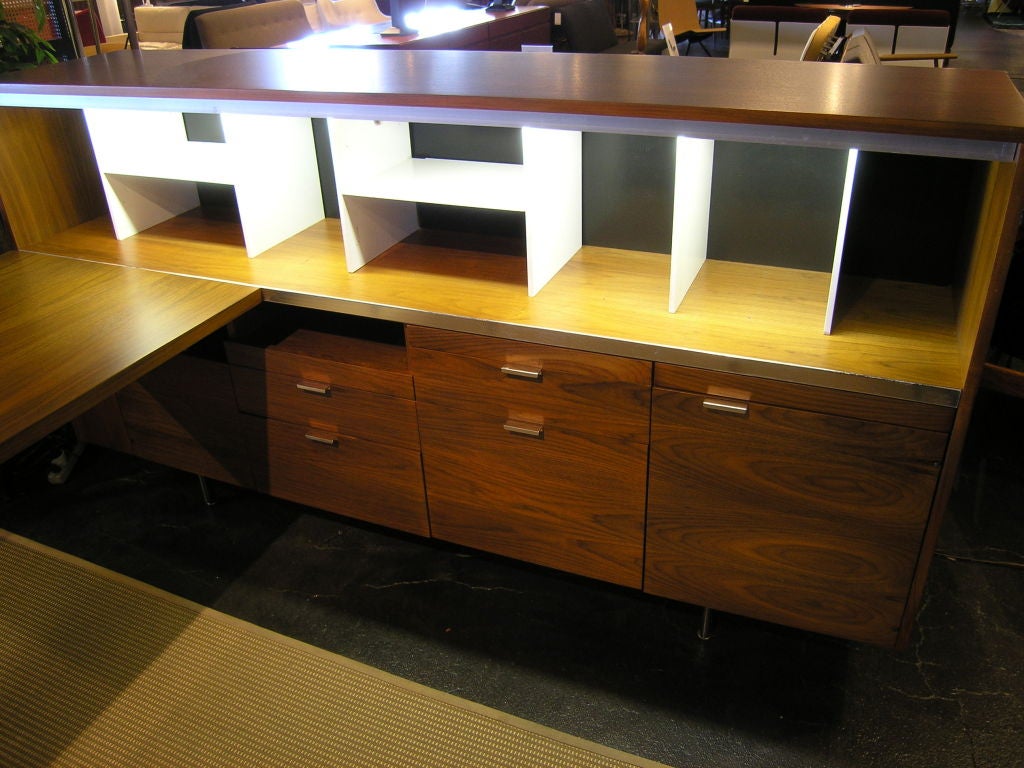 This large stately desk features a wall credenza with multiple shelves and drawers. Working lights are in the upper portion of the credenza. One large file drawer.<br />
<br />
Credenza measures 80.5