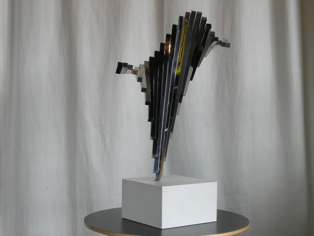 This beautiful chrome sculpture by David Brown was likely a model for a much larger piece. At 22
