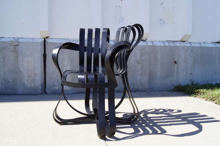 This exquisite sculptural chair won Time Magazine’s award for best design 1992.

This example was produced in 1993 and is signed and dated. Though this chair is still in production, the black has been discontinued.