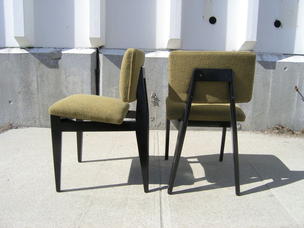 George Nelson designed his angular side chair, model #4668, for use at the dining table or work desk. The chair contrasts an ebonized birch frame with a comfortable seat and backrest upholstered in a soft green.

Two available.