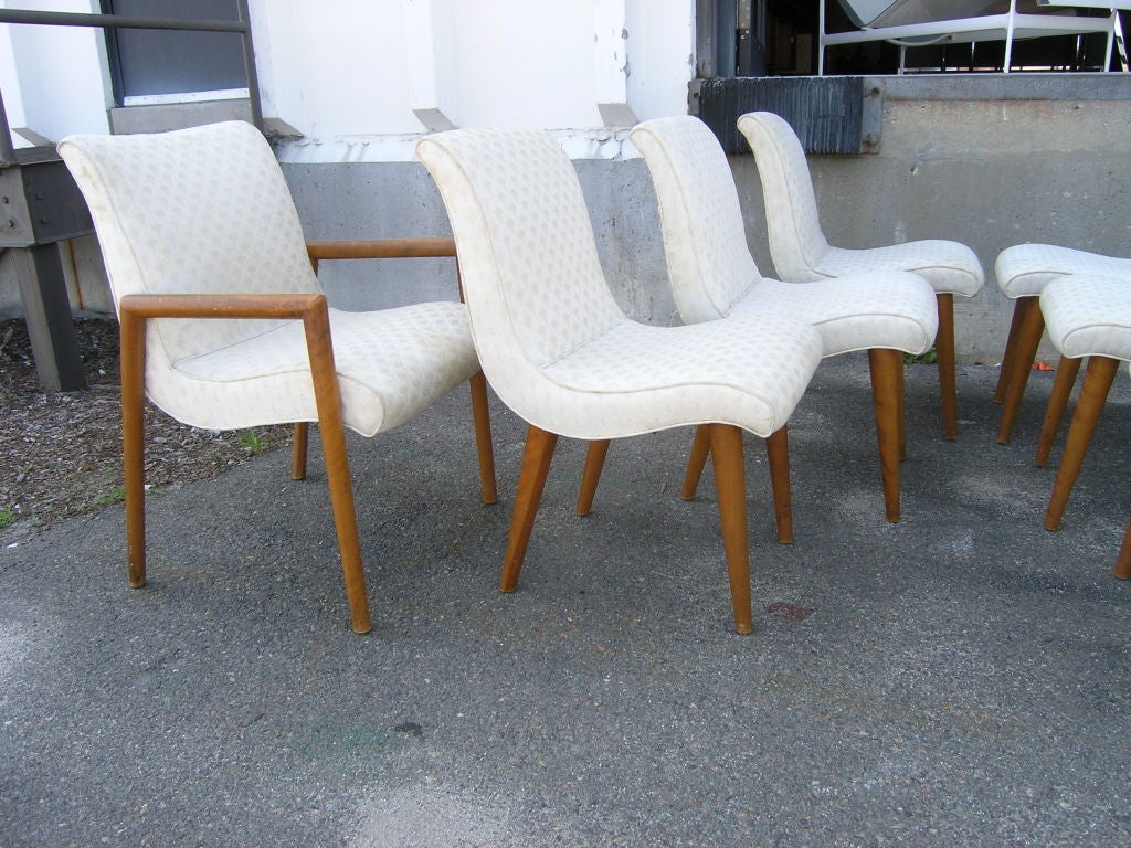 This set of six armless chairs and two armchairs were designed by Russel Wright for the Conant Ball 