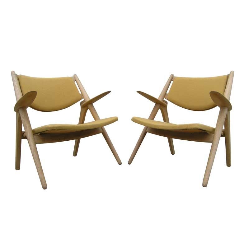 2 CH-28 Sawback Easy Chairs by Hans Wegner for Carl Hansen 
Son